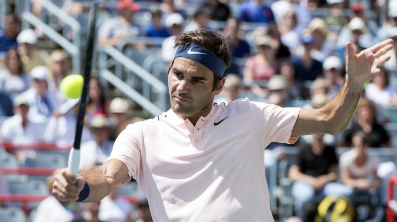 The Swiss star swatted aside Canadas Peter Polansky in just 53 minutes to book his place in the second round.(Photo: AP)