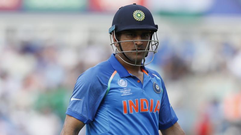 Although Dhoni remains supremely fit and his glove work is still of the highest quality, opinions are divided over whether age is catching up with his batting abilities. (Photo: AP)