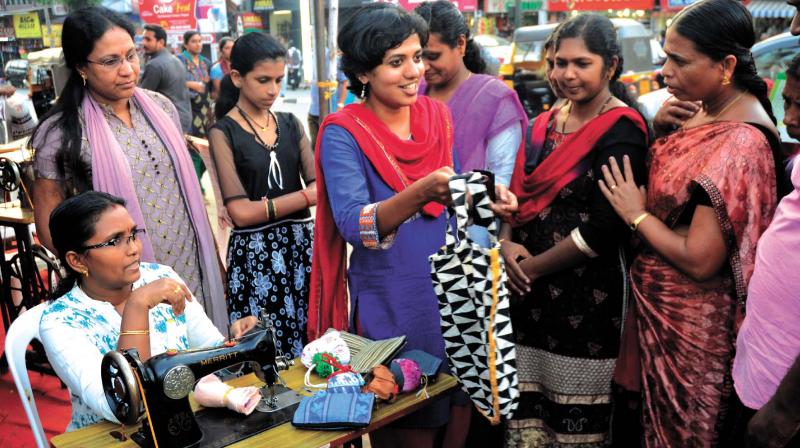 City corporation officials introduce Bhoomitra bags made out of waste cloths as part of the waste management programme in Thiruvananthapuram on Friday. (Photo: PEETHAMBARAN PAYYERI)