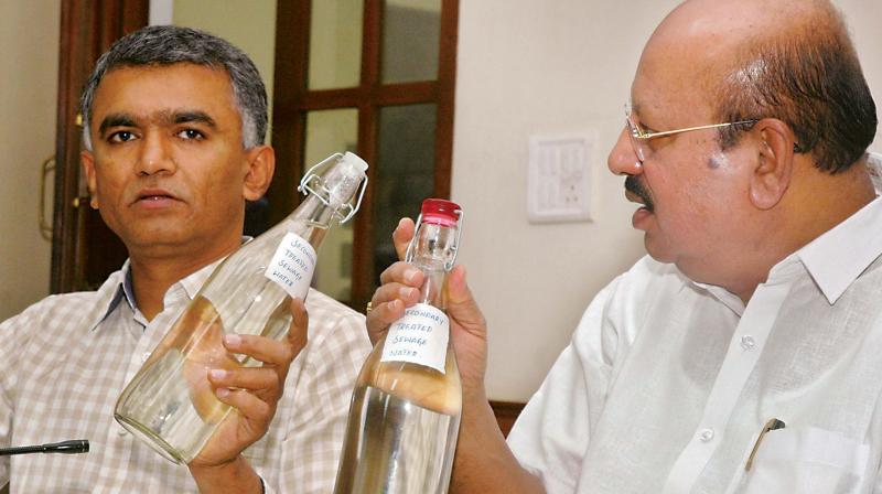 Agriculture Minister Krishna Byregowda and Law Minister  T. B. Jayachandra explain to media about releasing the  secondary treated sewage water into dry lakes,  in Bengaluru on Thursday  (Photo:DC)