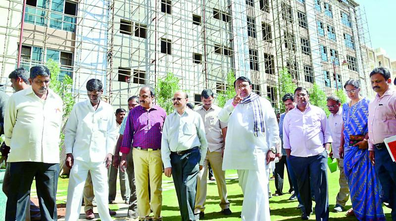 Assembly Speaker Pocharam Srinivas Reddy inspects the newly-constructed MLA quarters at Hyderguda in Hyderabad on Tuesday. (Photo: P. Surendra)