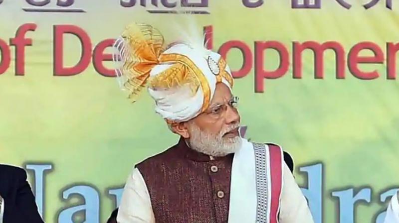 Addressing a rally in Imphal, Modi alleged that during previous governments, projects worth Rs 100 crore would be completed at an escalated cost of Rs 200-250 crore, and said this misuse of national wealth made him impatient. (Photo: PTI)