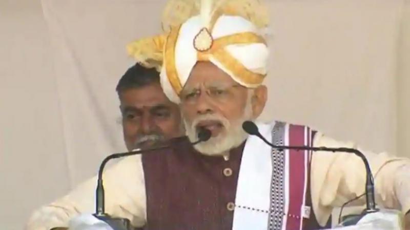 Prime Minister Narendra Modi on Friday assured the people of Assam that no genuine citizen will be left out of the NRC and hoped that the citizenship bill will be soon get Parliaments nod. (Photo: Twitter/BJP4India)