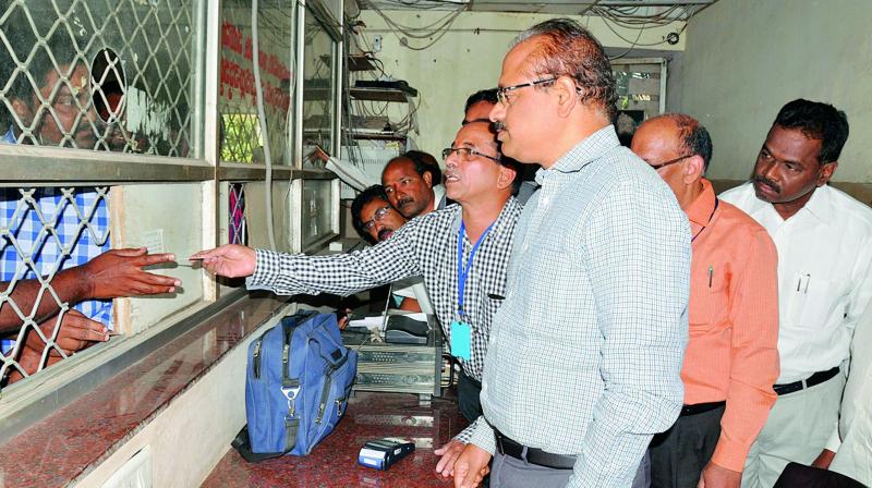 East Godavari District Collector H. Arun Kumar inaugurates Mini ATM at the Government General Hospital in Kakinada on Thursday.(Photo: DC)