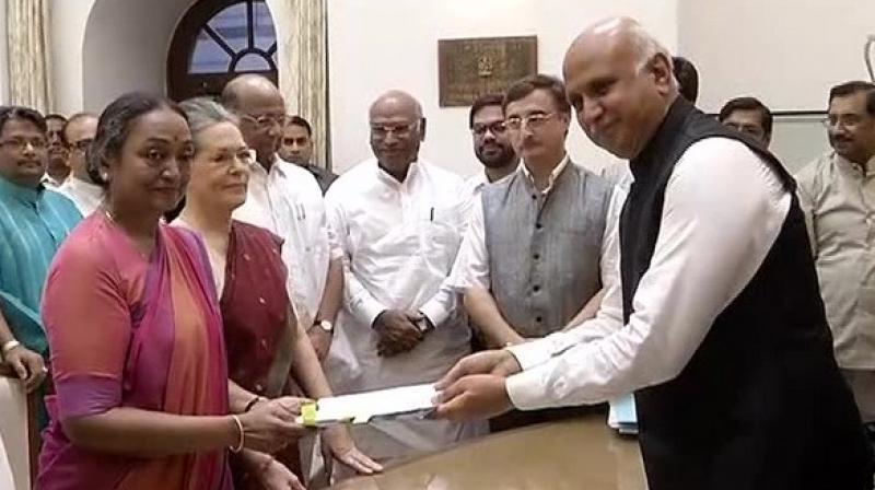 Opposition presidential candidate Meira Kumar files her nomination in the presence of top Congress and Opposition leaders. (Photo: )