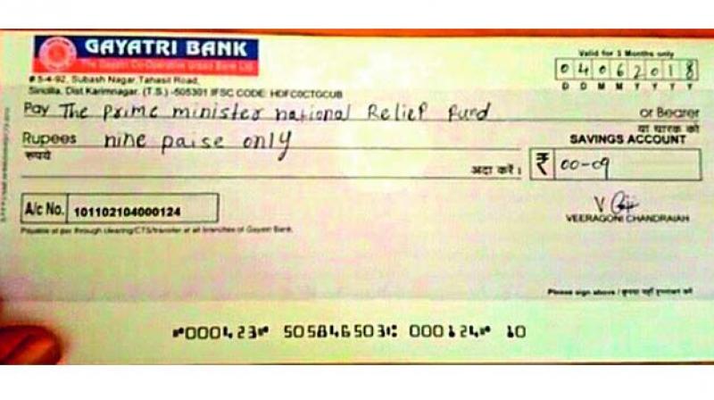 Cheque of 9 paise donated for Prime Ministers Relief Fund.