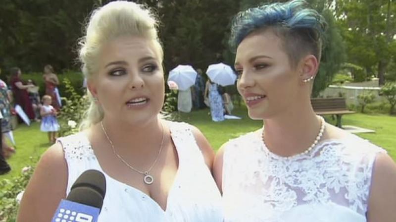 Lauren Price, 31, and Amy Laker, 29, exchanged vows in Sydney because their families had to travel from Wales in the UK to attend what was to have been their commitment ceremony. (Photo: File)