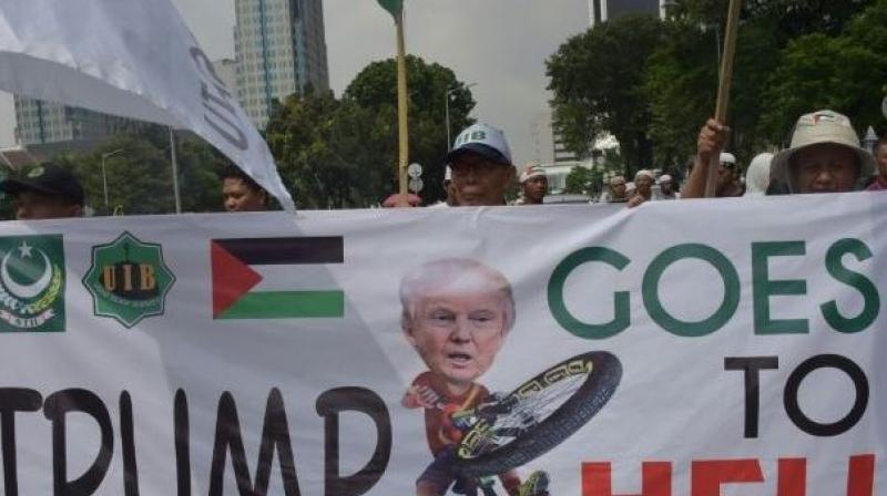 80,000 protesters gathered at the National Monument, waving the Palestine flag and banners reading Free Palestine as they chanted God is greatest!, says police. (Photo: AFP)