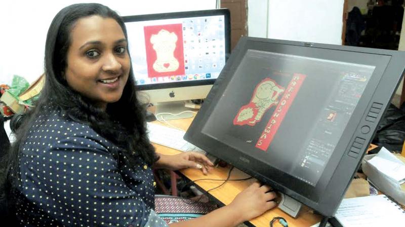 Sharon Rani, graphic designer, works on the series Pullikkari. (Photo: DC)