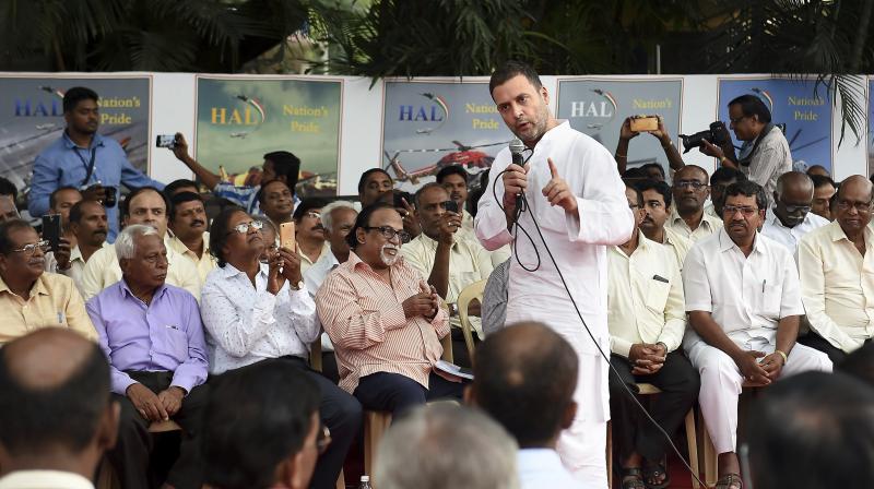Gandhi, who is standing in support of HAL, will meet and interact with the employees of the public sector unit outside its headquarters in Bengaluru. (Photo: PTI)