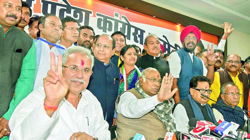 Senior Congress leader Mallikarjun Kharge, Chhattisgarh Chief Minister-designate Bhupesh Baghel, Congress state in-charge P.L. Punia and others during a press conference  in Raipur on Sunday.(PTI)