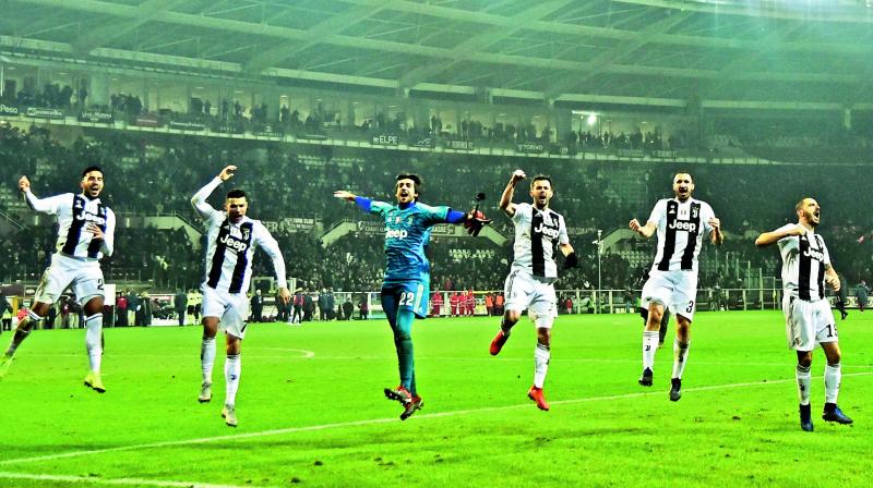 (From left) Juventus Emre Can, Cristiano Ronaldo, goalkeeper Mattia Perin, Miralem Pjanic, Giorgio Chiellini and Leonardo Bonucci acknowledge fans after their Serie A match against Torino.  (AFP)