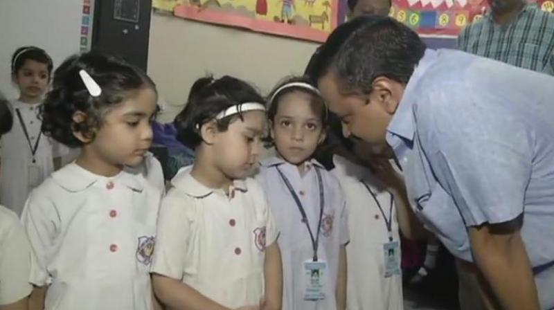 Delhi Chief Minister Arvind Kejriwal and his deputy Manish Sisodia interacted with students and teachers there. (Photo: Twitter | ANI)