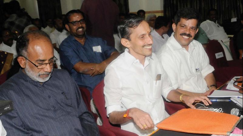 BJP national executive member Alphons Kannanthanam, state general secretary M. T. Ramesh and general secretary M. Ganesh at the state office-bearers meet in Thiruvananthapuram on Saturday. (Photo: DC)