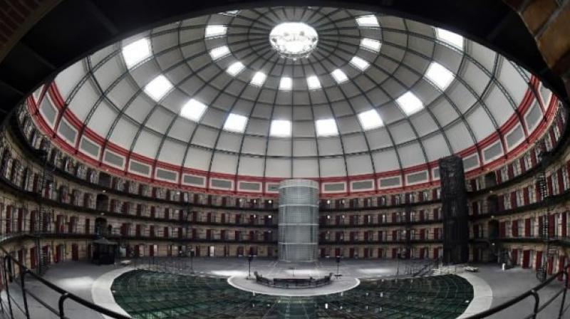 This photo taken on June 9, 2017, shows the inside of Boschpoort Prison, a dome-shaped prison in Breda, which is being transformed into offices and an entertainment venue following a drop in incarcerations in Dutch prisons for the past 20 years. (Photo: AFP)