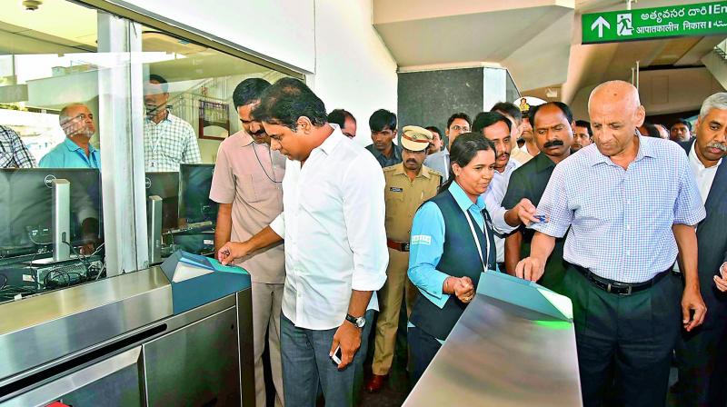 Governor E.S.L. Narasimhan along with IT, urban development minister K.T. Rama Rao, Hyderabad Metro Rail MD N.V.S Reddy and others take a Metro trial run from SR Nagar to Miyapur on Wednesday. Senior officers of L&T group from Mumbai and others were present during the test ride. (Photo: DC)