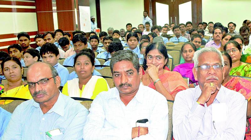 Architects, APREDA, CREDAI and other CRDA officials attending World Planning Day in Guntur city. (Photo: DC)
