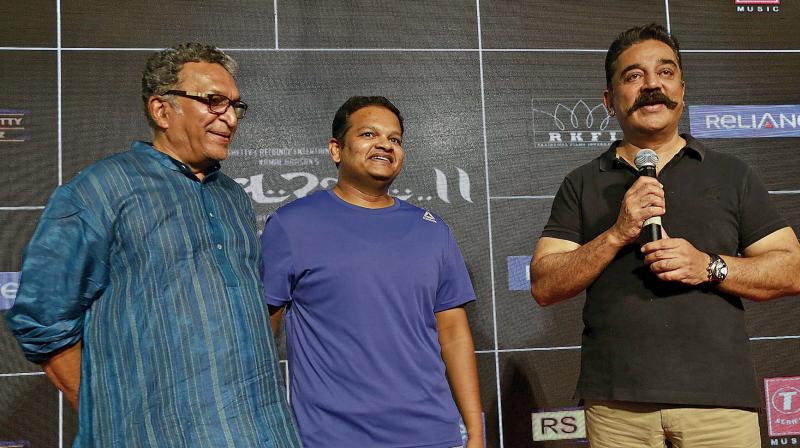 Actor Kamal Haasan along with music  director Mohamaad Ghibran  (middle) and actor Nassar (left) at the  trailer launch of  Vishwaroopam-2  at his office, on Monday (Photo: AP)