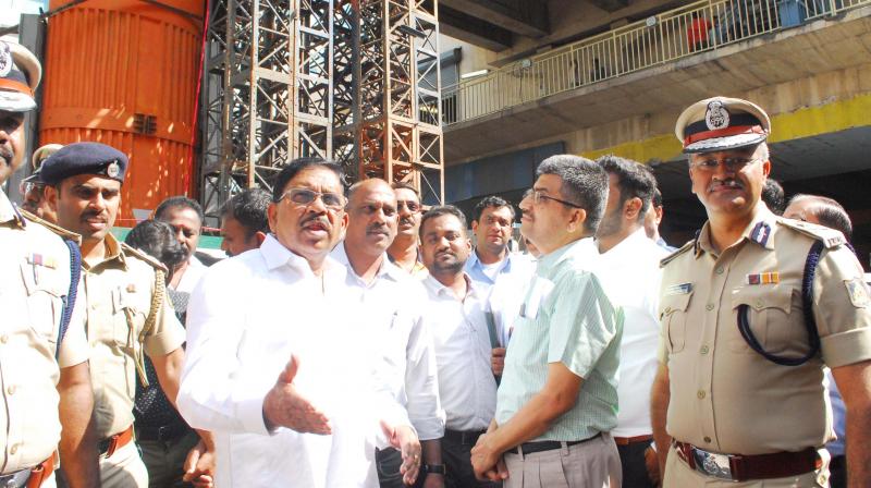 Deputy Chief Minister Dr G. Parameshwar inspects the cracked pillar at Trinity Metro Station in Bengaluru on Saturday (Photo:DC)