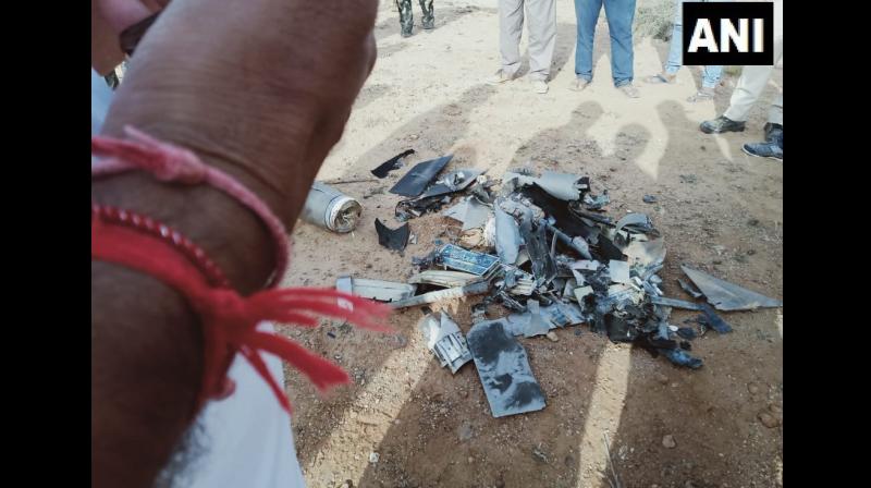 On hearing a loud sound around 6 am, villagers went to the spot and found the debris of the UAV. (Photo: ANI)