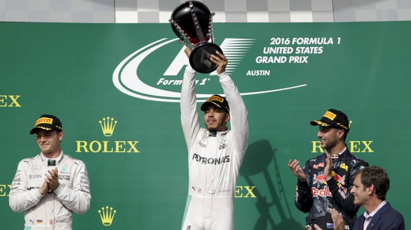 Lewis Hamilton produced a flawless drive from pole position to finish almost five seconds ahead of his Mercedes team-mate and championship leader Nico Rosberg to seal the 50th win of his glittering Formula One career. (Photo: AP)