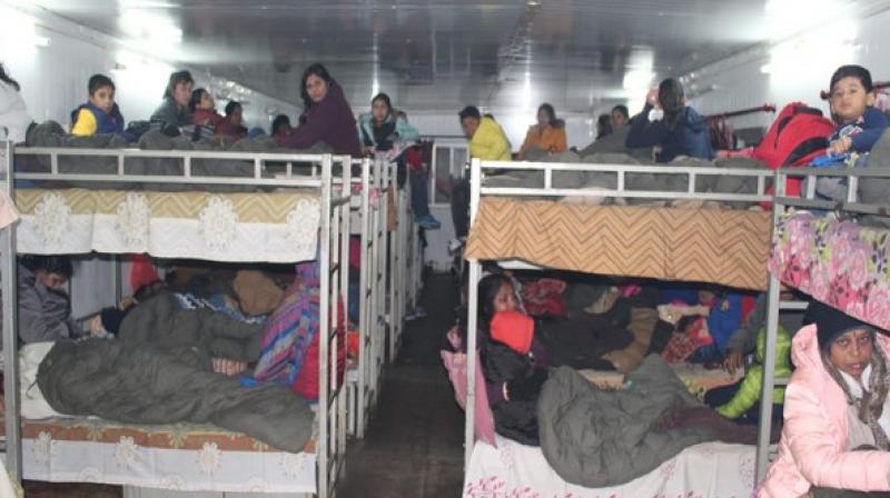 The tourists including women and children who were stranded between the 17 Mile area and Nathu La in Sikkim have now been provided food, shelter and warm clothes by the Army, a Defence Ministry official said. (Photo: ANI)