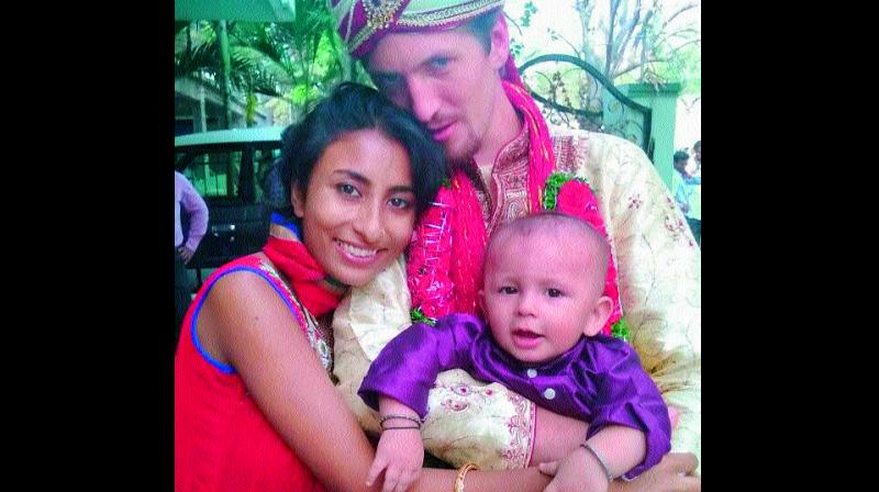 Alex Ermakaov and his wife Sanam ul Haq with their son Nestor Ermakov.