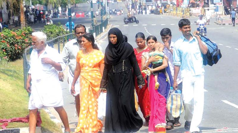 Passengers  coming to railway station on the hartal day in Thiruvananthapuram on Thursday. (Photo: A.V. MUZAFAR)