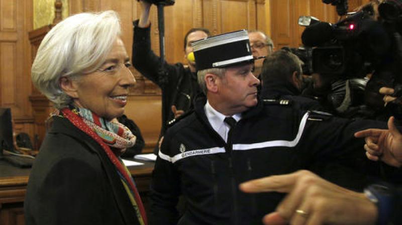 Christine Lagarde, right, arrives at the special Paris court, France. (Photo: AP)