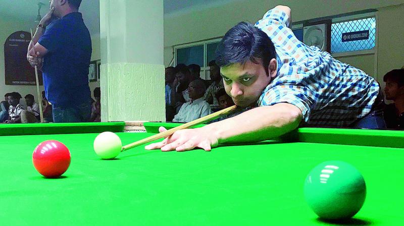 Tejinder Agarwal lines up a shot during his third round match against Addala Kalyan Verma of the 32nd Fateh Maidan Club Open Billiards and Snooker tournament being played in Hyderabad. Tejinder won 3-2 (55-31, 9-62, 58-44, 46-50, 52-17).