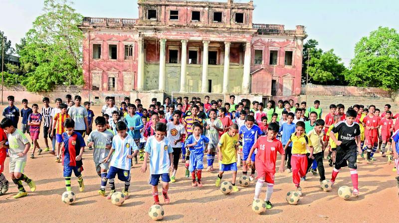 Footballers go through a summer coaching camp conducted by the Hyderabad Globe football club at the Khurshid Jah Playground in Hyderabad.