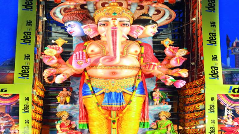 Khairatabad Ganesh Utsav Committee chairman, Sudarshan said on Sunday that the idol would be 57 feet tall, 1 foot shorter than last time.