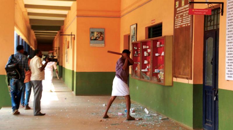 Student activists attack Nehru College of Engineering after the suicide of Jishnu Prannoy. 	DC FILE