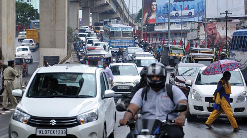 North rail overbridge was choc-a-bloc with traffic moving at a snails pace during the incessant rains in Kochi on Saturday. (Photo: Sunoj Ninan Mathew)