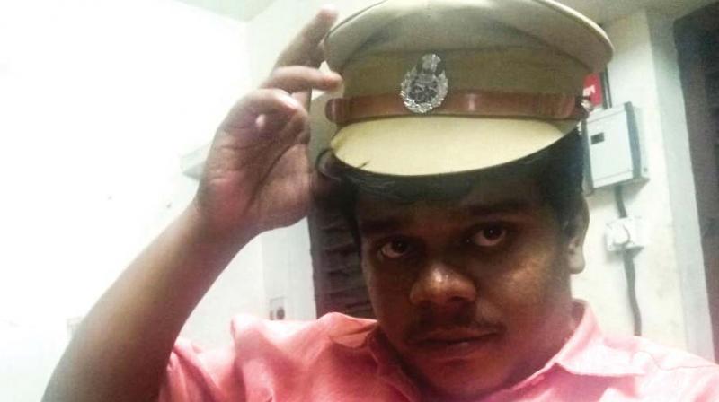 He took the selfie wearing the cap of grade SI Anil Kumar and shared it on social networking sites.