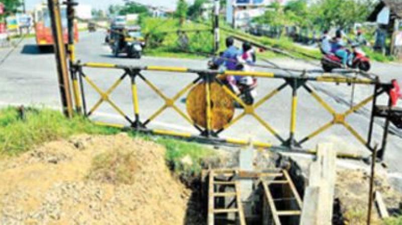 Vathuruthy railway gate. 	 DC File