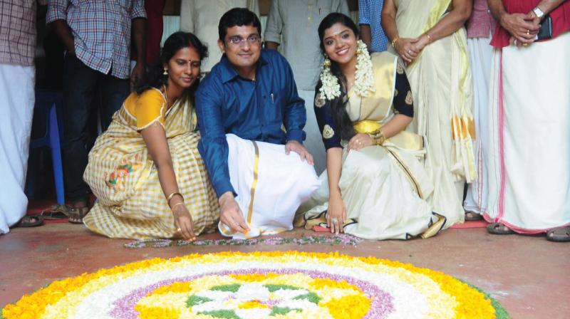 District collector Dr A. Kowsigan and his wife Dr. Krithika during the Onam celebrations at Thrissur Collectorate on Monday  (Photo: ANUP K VENU)