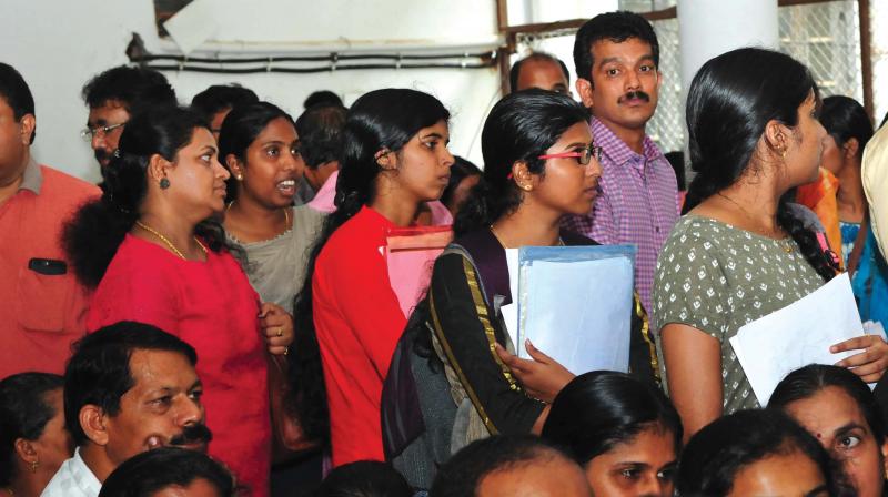 Students wait for their turn at the centre set up by the Commissioner for Entrance Examinations. 	 DC File