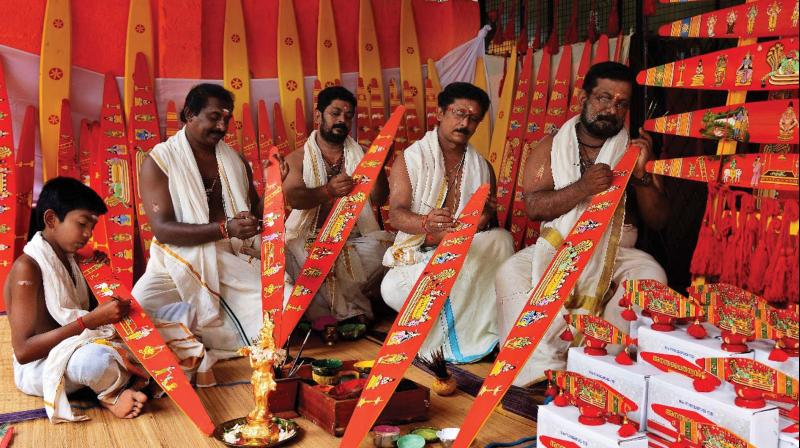 Onavillu family make bows to be given as an offering at Sree Padmanabha Temple.