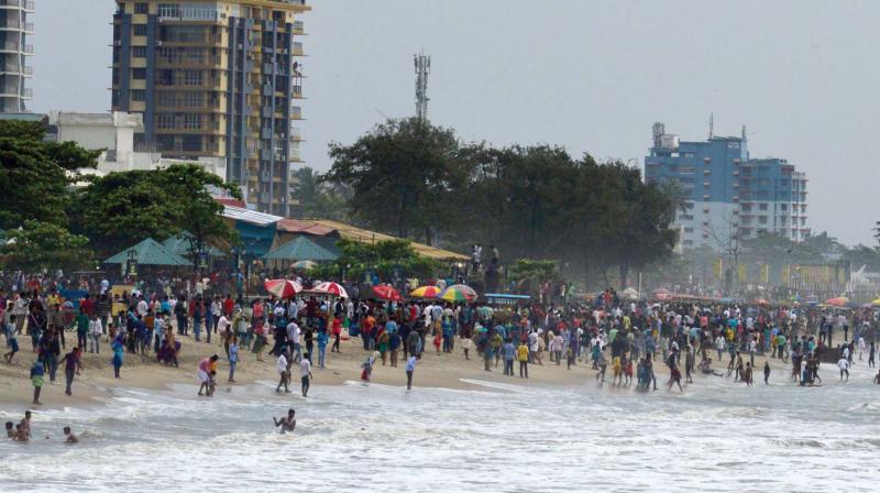 People make a beeline to Kozhikode beach on the occasion of Bakrid and Onam festivals on Friday. (Photo: PRIYANKA P. MENON)