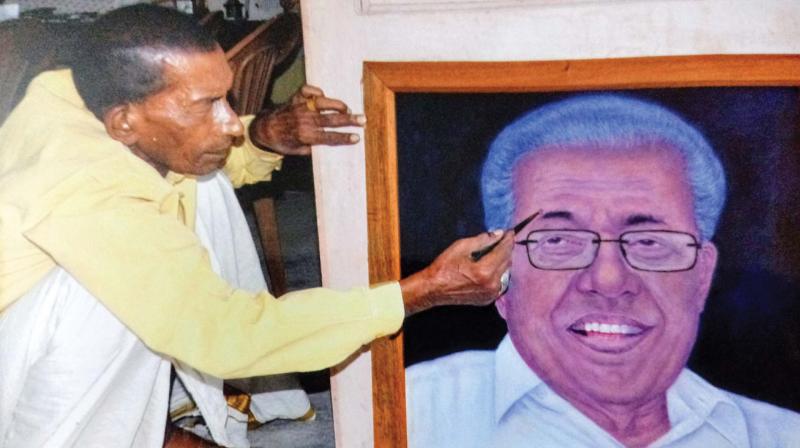 Radhakrishnan Pillai completes the portrait of Chief Minister Pinarayi Vijayan.