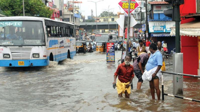 A flooded Thampanoor road after the heavy rains on Thursday (Photo: A. V. MUZAFAR)