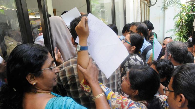 A woman helps her daughter enter the MBBS Counselling Hall at the medical college in Thiruvananthapuram. 	 DC FILE