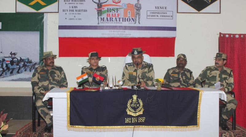 BSF Thrissur Commandant Ajith Kumar V. makes the announcement about the marathon in Thrissur on Monday. (Photo: DC)