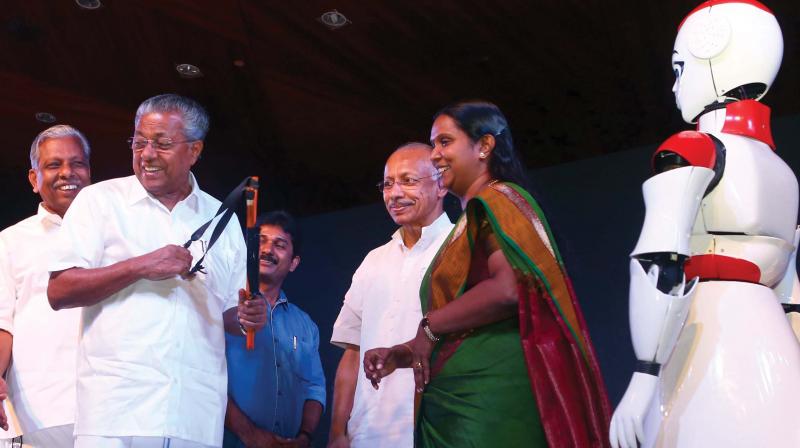 Chief Minister Pinarayi Vijayan releases the signature film with the help of sling-shot  at inauguration of YES 3D in Kochi on Tuesday. Industries minister A.C. Moideen, M. Swaraj, MLA, KSIDC chairman Christy Fernandez and Managing Director M.Beena are also seen. Visitors have a firsthand experience on brain wave nerve excitation for the physically disabled, developed by Students of  SCMS School of Engineering and Technology at YES 3D in Kochi. Pictures by SUNOJ NINAN MATHEW