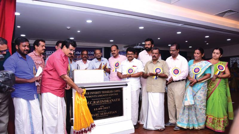 Education Minister C. Raveendranath lays the foundation stone for the students welfare centre at Kannur University headquarters at Thavakkara in Kannur on Friday. Pro vice-chancellor Dr T. Asokan among others look on. (Photo: DC)