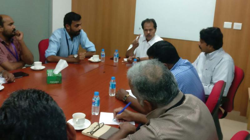 P.T. Thomas, MLA, presides over the meet held as part of forming the Infopark Forum.