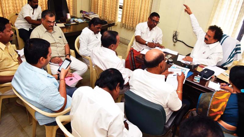 Sudarshan Nachiappan, AICC returning officer for organisational elections, holds talks with the returning officers from the 14 districts at Indira Bhavan in Thiruvananthapuram on Sunday. (Photo: DC)