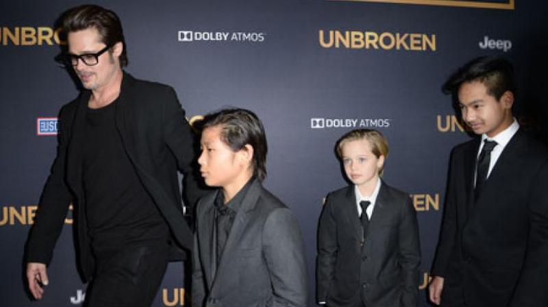 Brad Pitt with his kids (Photo: AFP)