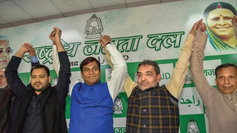 A file photo of RJD leader Tejashwi Yadav with other grand alliance leaders in Patna